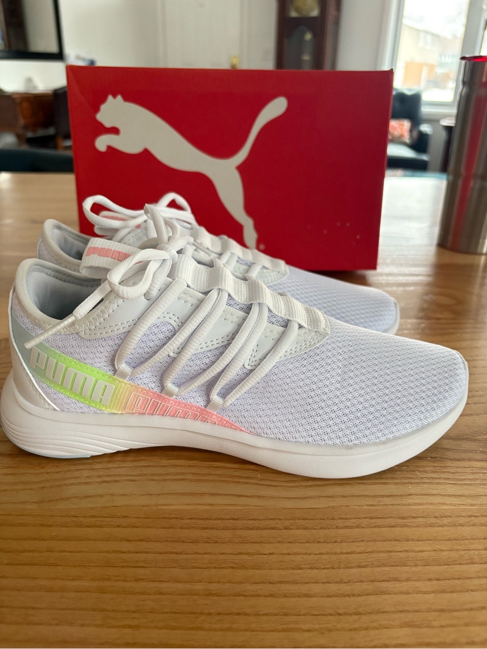 Puma White Women's Lightweight soft ride sneakers